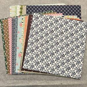 Set of scrapbooking paper (61 double sided)